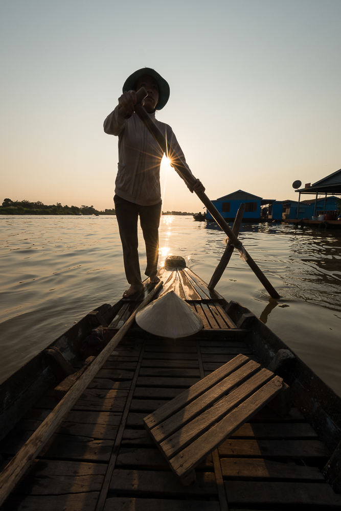 Boatwoman 'Mai'  guiding boat through Tonle Sap River, Floating Villages of Phoum Kandal, Kompong Chnang, Cambodia, Indochina, Asia