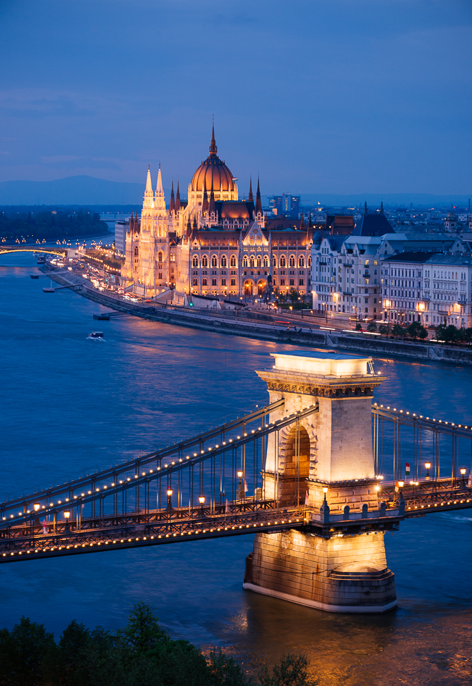 View over River Danube, Chain Bridge and Hungarian Parliament Building at night, Budapest, Hungary